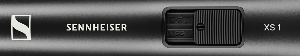 Detailansicht des Sennheiser XS 1 Mikrofons mit eingelassenem Ein-/Ausschalter.